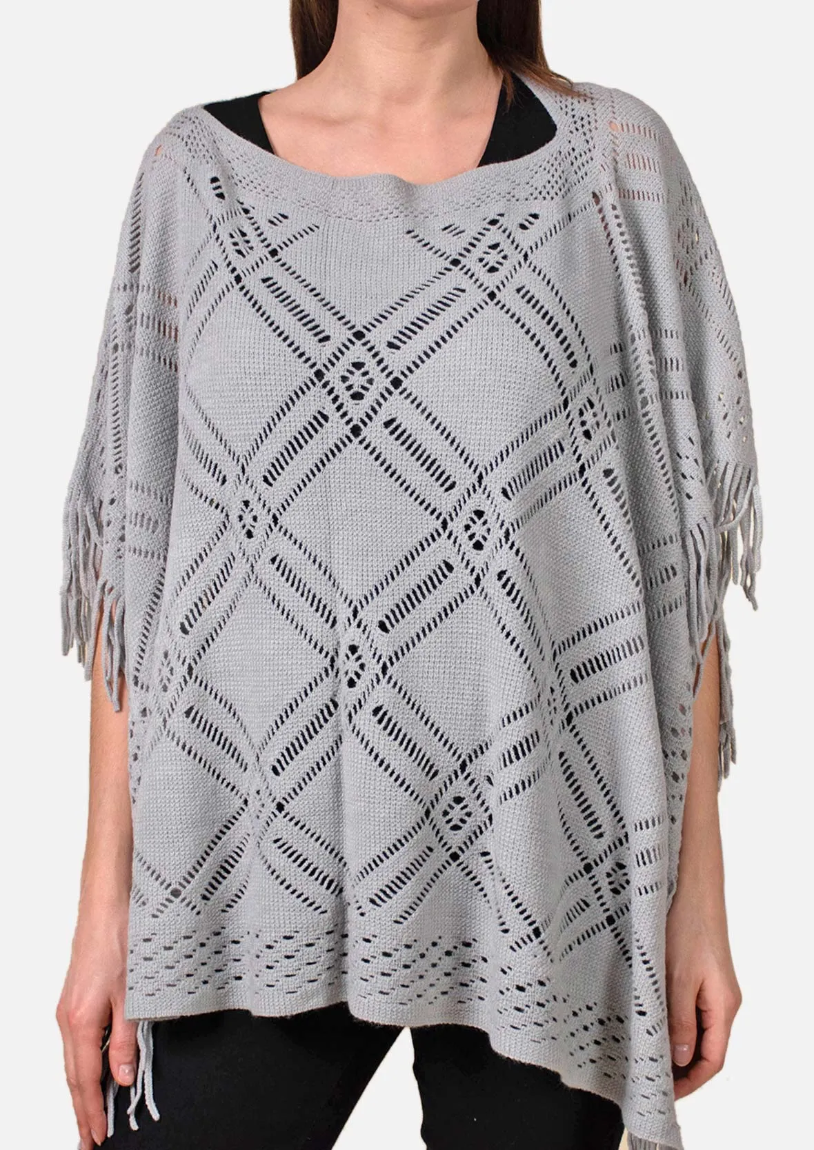 Knitted Poncho With Fringe Detailing